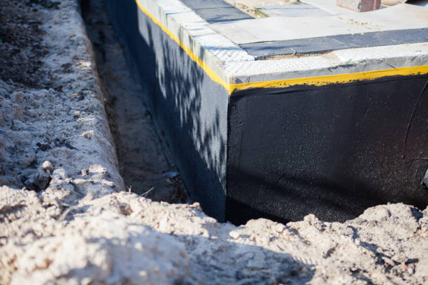 Professional Exterior Waterproofing technician working in New Goshen, IN